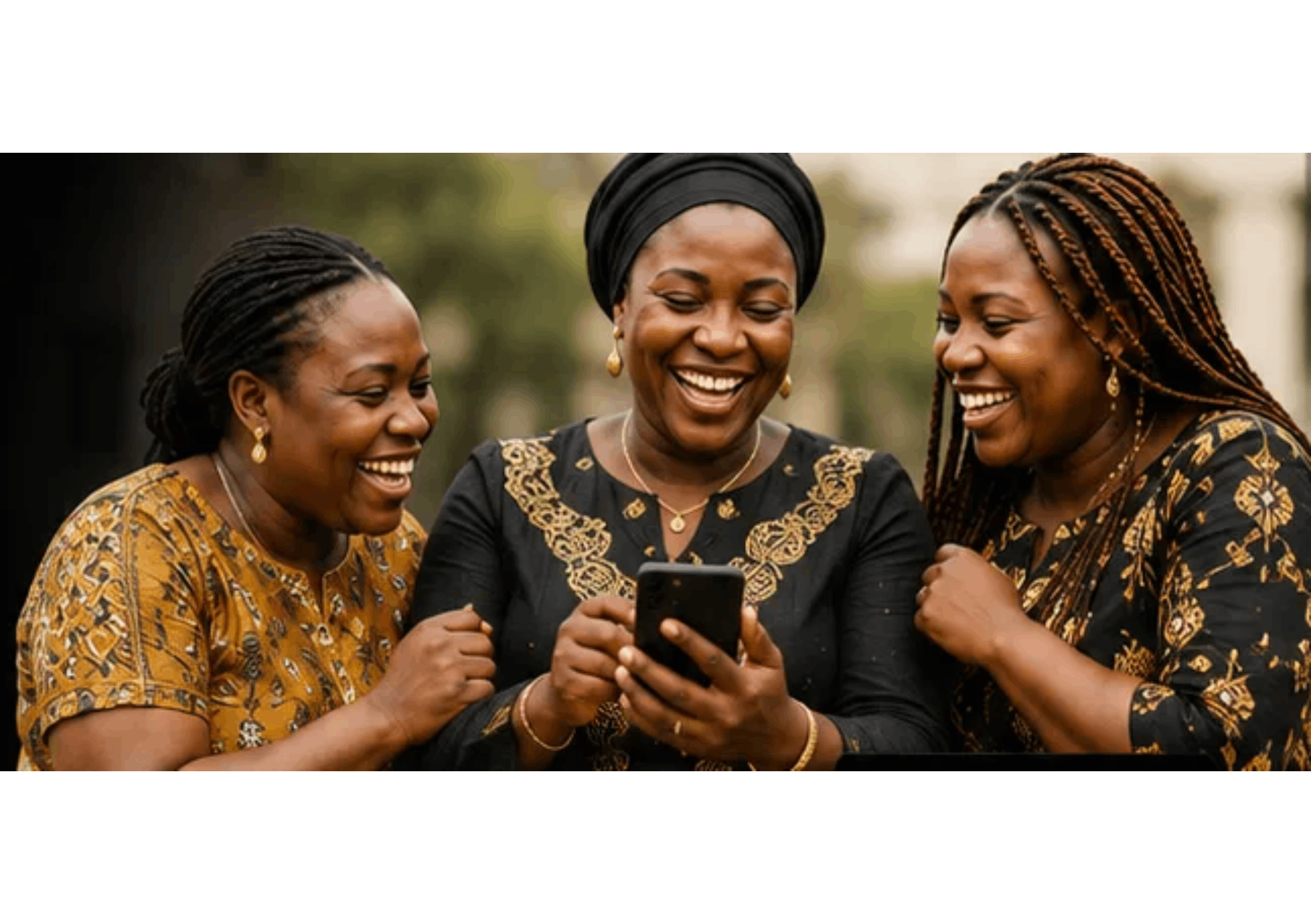 Three smiling women in traditional Ghanaian attire checking their susu savings group on a phone